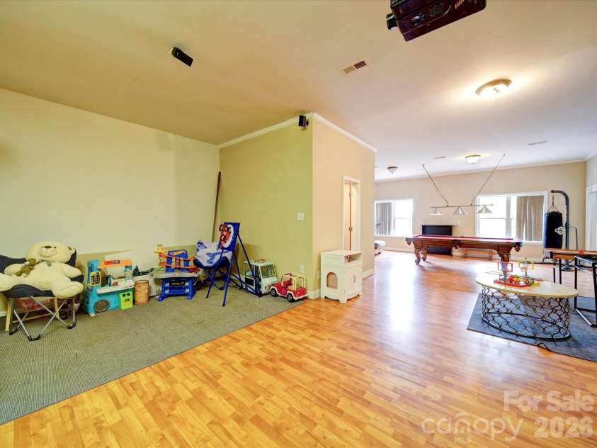 135 Boulder Ridge Drive, Denton, NC 27239.  MLS# CAR4244687, YatesRealty ID 19121. Projector w/4 theater seats