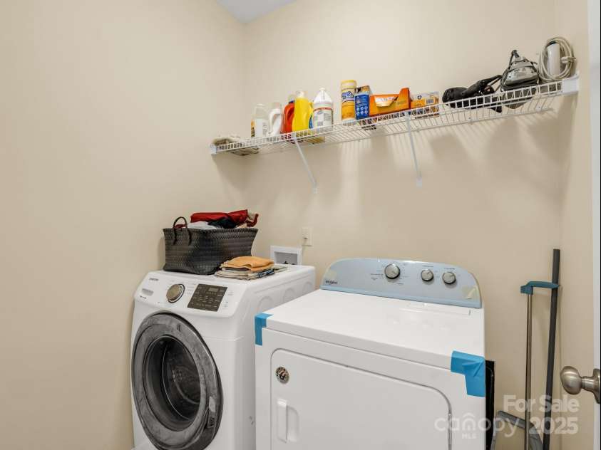 24 Yorktown Circle, Arden, NC 28704.  MLS# CAR4262895, YatesRealty ID 19123. Downstairs laundry
