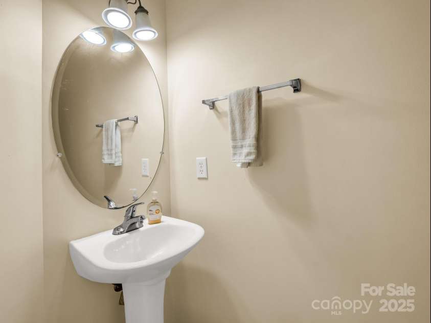 24 Yorktown Circle, Arden, NC 28704.  MLS# CAR4262895, YatesRealty ID 19123. Half bath downstairs