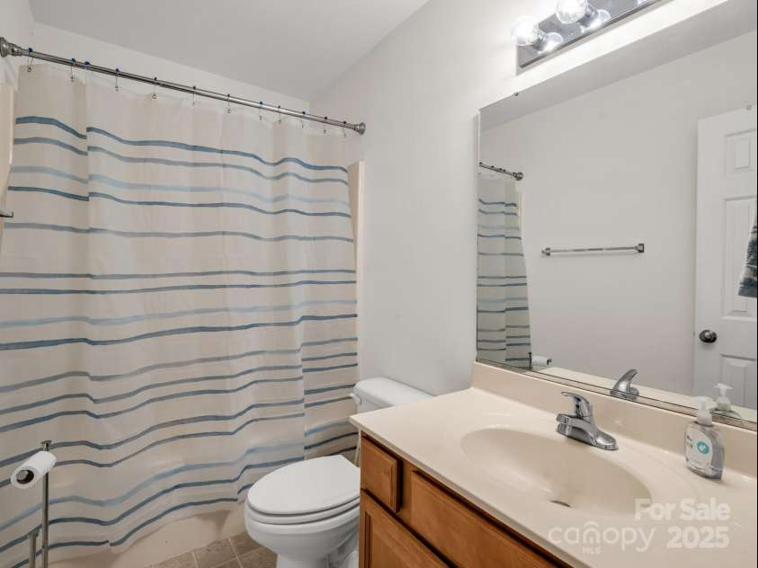 24 Yorktown Circle, Arden, NC 28704.  MLS# CAR4262895, YatesRealty ID 19123. Upstairs bathroom