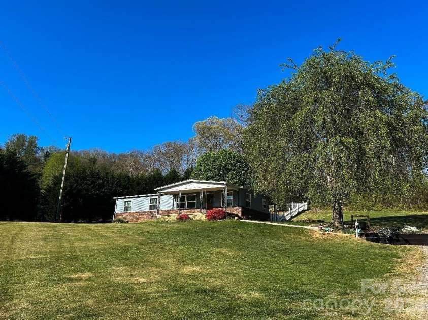 188 Wiggins Road, Candler, NC 28715.  MLS# CAR4377561, YatesRealty ID 19126. 