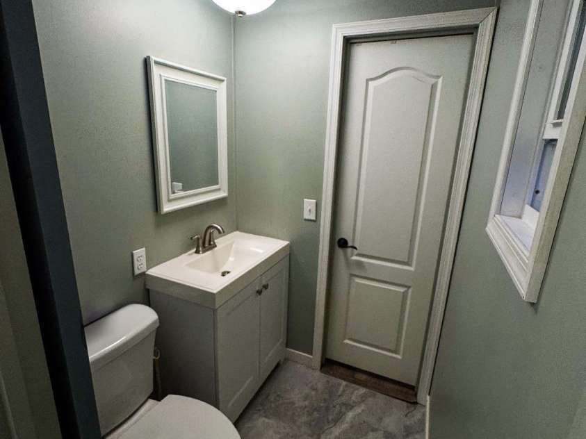 188 Wiggins Road, Candler, NC 28715.  MLS# CAR4377561, YatesRealty ID 19126. Half Bath
