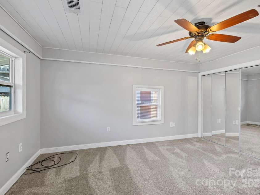 16 Rosscraggon Drive, Asheville, NC 28803.  MLS# CAR4219971, YatesRealty ID 19128. Primary Bedroom