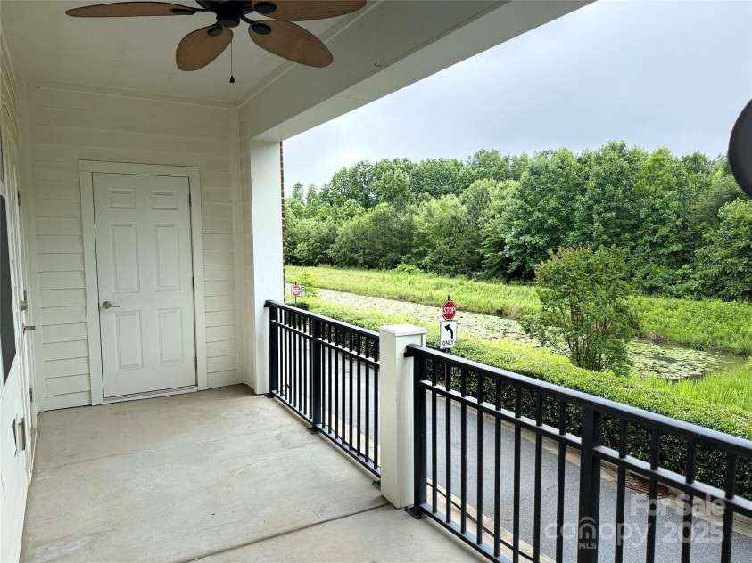 129 Steinbeck Way, Mooresville, NC 28117.  MLS# CAR4263974, YatesRealty ID 19139. Rear Porch View
