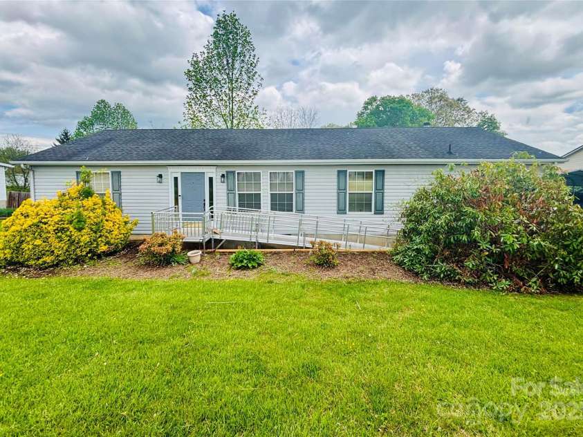 16 English Oaks Drive, Candler, NC 28715.  MLS# CAR4258090, YatesRealty ID 19142. Front of home