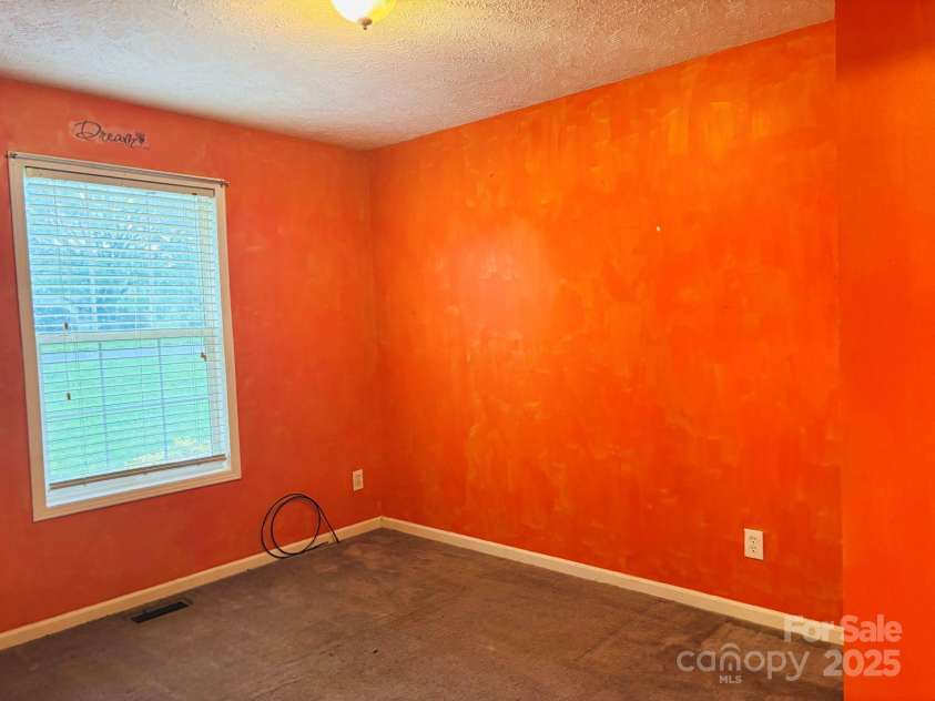 16 English Oaks Drive, Candler, NC 28715.  MLS# CAR4258090, YatesRealty ID 19142. Guest room