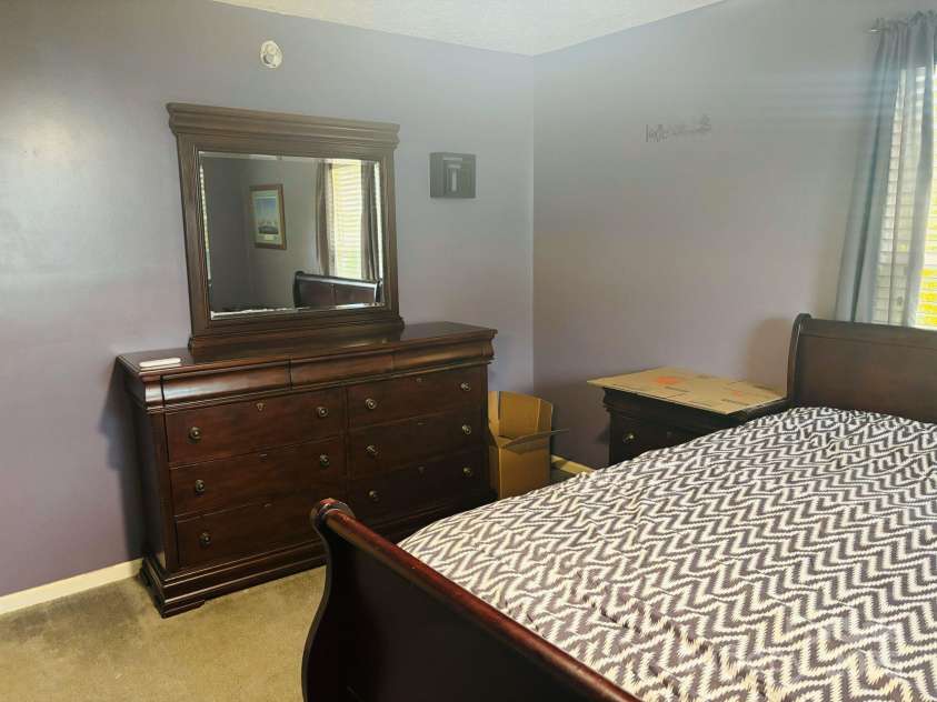 16 English Oaks Drive, Candler, NC 28715.  MLS# CAR4258090, YatesRealty ID 19142. Primary bedroom