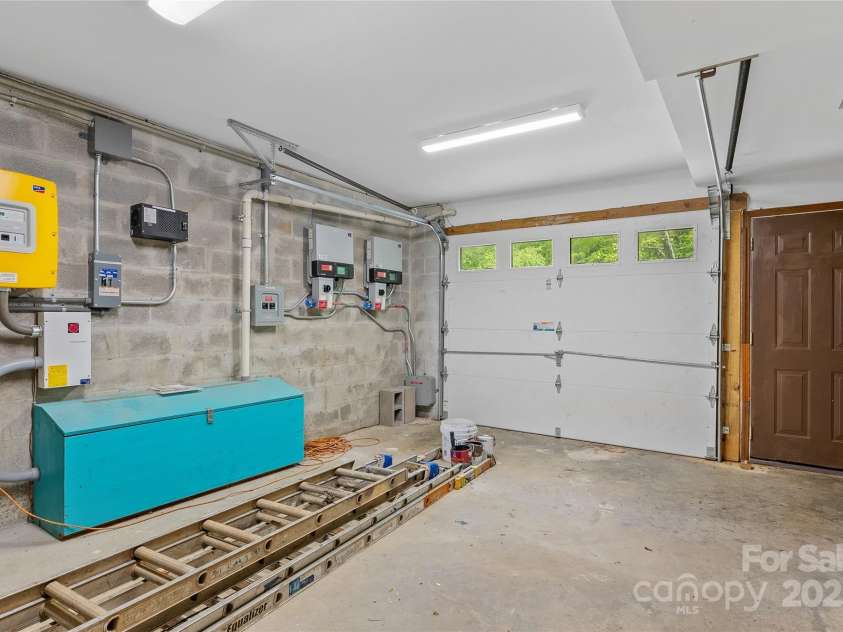 315 Morgan Branch Road, Leicester, NC 28748.  MLS# CAR4252510, YatesRealty ID 19145. Basment/garage