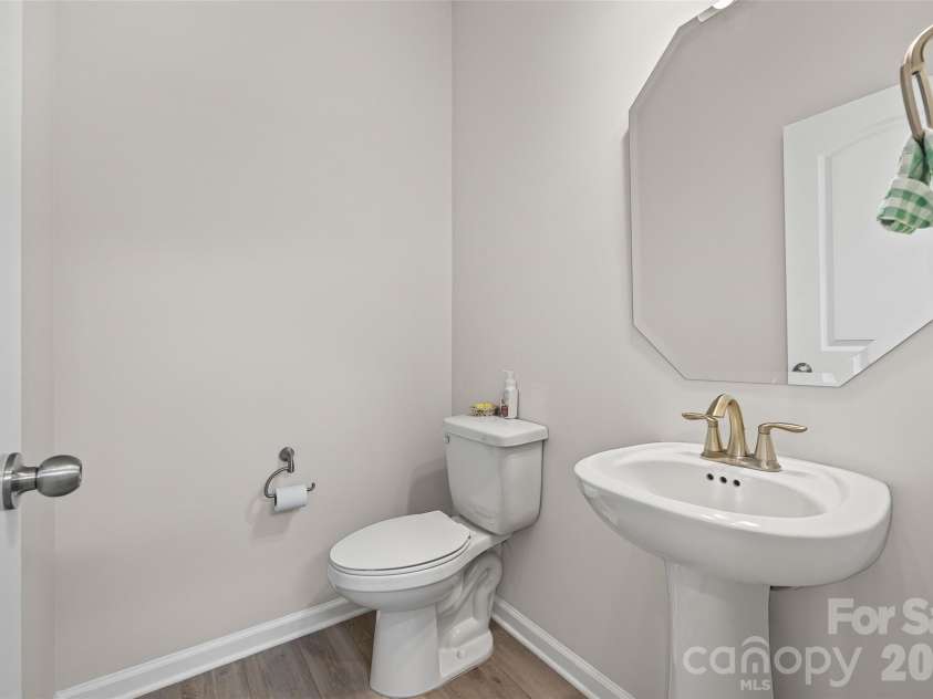 15345 Braid Meadow Drive, Charlotte, NC 28278.  MLS# CAR4373070, YatesRealty ID 19150. Downstairs bathroom