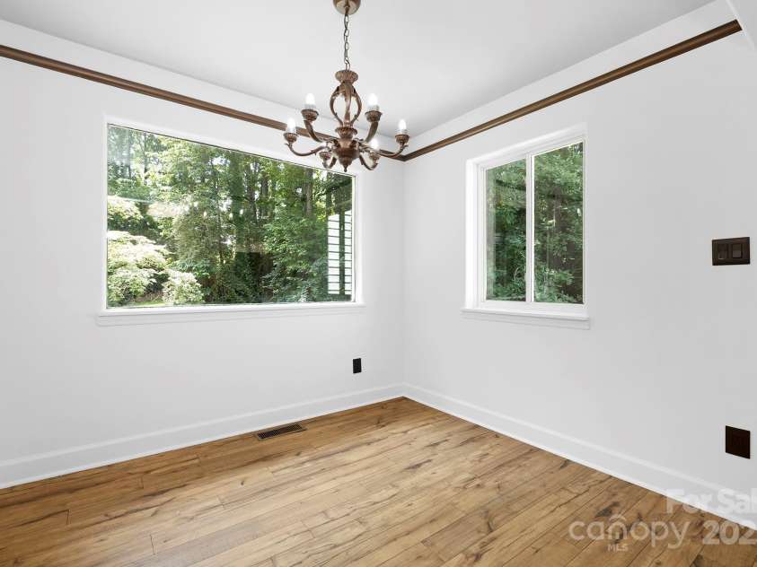10101 Wood Court, Charlotte, NC 28277.  MLS# CAR4268074, YatesRealty ID 19152. Dining area overlooks the lush private backyard