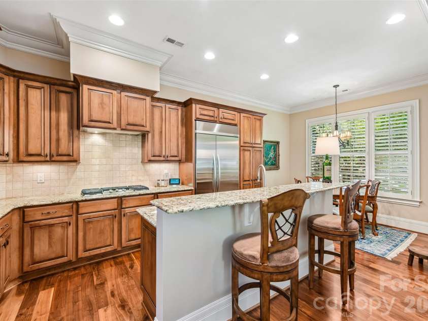5208 Shepley Court, Charlotte, NC 28226.  MLS# CAR4366293, YatesRealty ID 19154. Beauty and functionality come together in the central hub for effortless entertaining