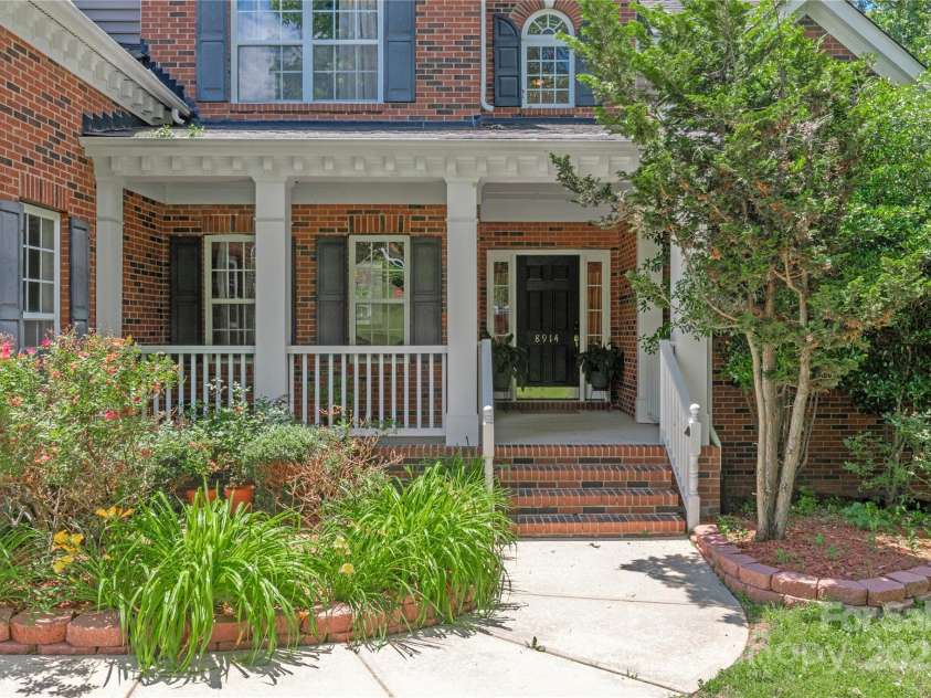 8914 Landsdowne Avenue, Harrisburg, NC 28075.  MLS# CAR4259422, YatesRealty ID 19156. Patio to entryway
