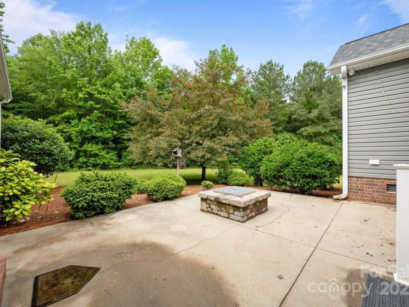 230 Shag Bark Lane, Salisbury, NC 28146.  MLS# CAR4257642, YatesRealty ID 19159. Fire Pit on Back Patio