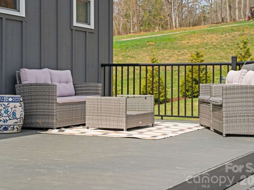 16 Hare Ridge, Asheville, NC 28803.  MLS# CAR4366214, YatesRealty ID 19164. Expansive rear deck