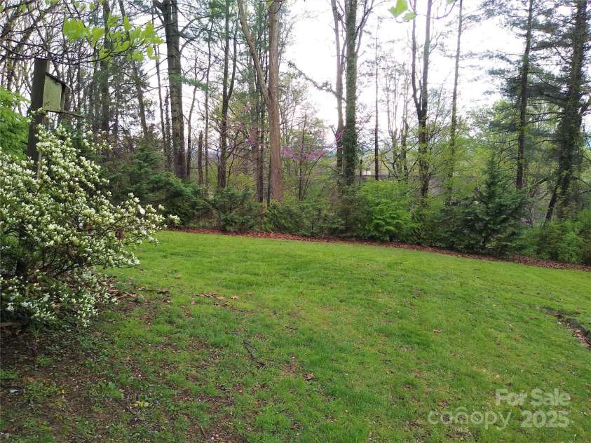 242 Birch Lane, Arden, NC 28704.  MLS# CAR4249293, YatesRealty ID 19164. Beautiful green space
