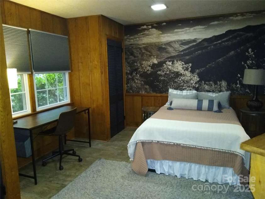 242 Birch Lane, Arden, NC 28704.  MLS# CAR4249293, YatesRealty ID 19164. Bedroom #3 is located off the living room, has an awesome Sepia Wall Mural of the Mountains and two closets.