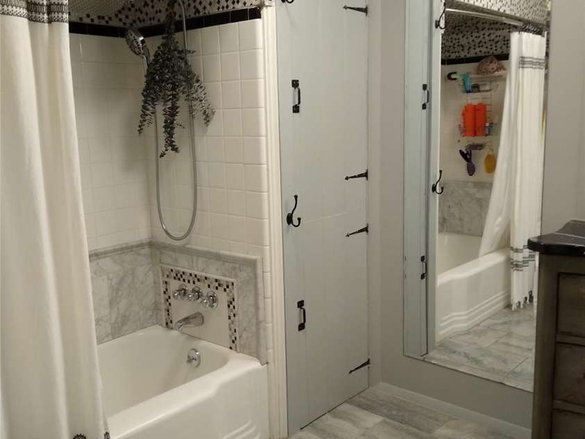 242 Birch Lane, Arden, NC 28704.  MLS# CAR4249293, YatesRealty ID 19164. Built in storage/porcelain floors