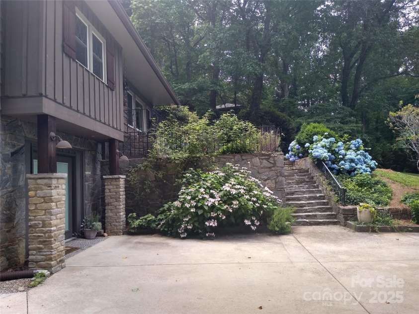 242 Birch Lane, Arden, NC 28704.  MLS# CAR4249293, YatesRealty ID 19164. Cherokee stone, steps and landscape rock work