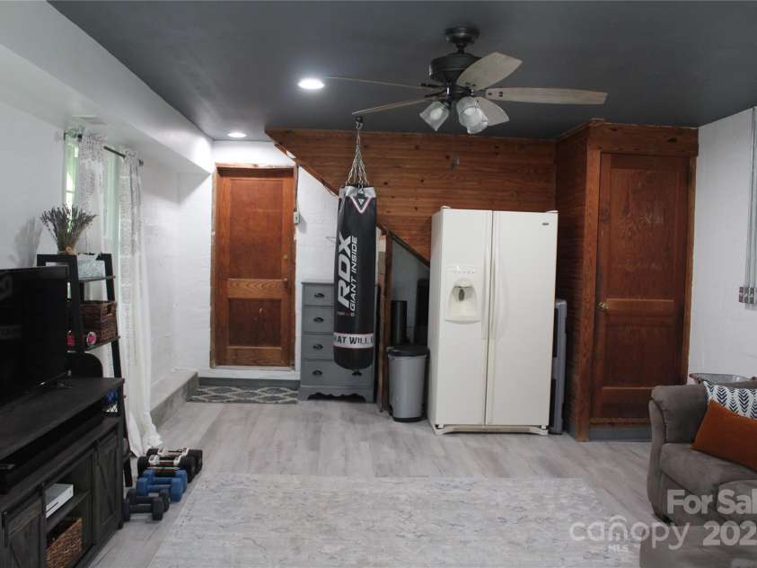 242 Birch Lane, Arden, NC 28704.  MLS# CAR4249293, YatesRealty ID 19164. Flex Space/Family Room with luxury vinyl plank fooring