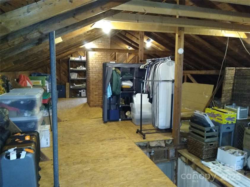 242 Birch Lane, Arden, NC 28704.  MLS# CAR4249293, YatesRealty ID 19164. Huge 1710 sq. ft. walk up attic space with 539 sq. ft. having a ceiling height at 7ft. or above.