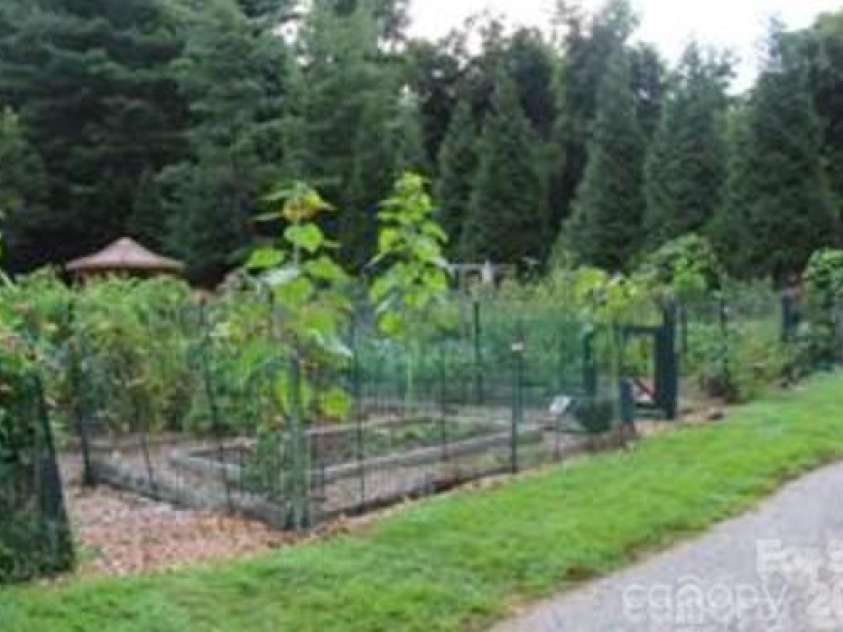 521 Crowfields Lane, Asheville, NC 28803.  MLS# CAR4361859, YatesRealty ID 19170. Community Gardening is available.