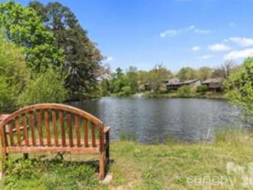 521 Crowfields Lane, Asheville, NC 28803.  MLS# CAR4361859, YatesRealty ID 19170. Pond