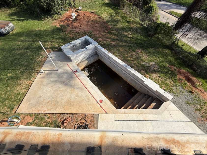 620 Cross Trail Drive, Charlotte, NC 28204.  MLS# CAR4362896, YatesRealty ID 19177. Unfinished inground pool