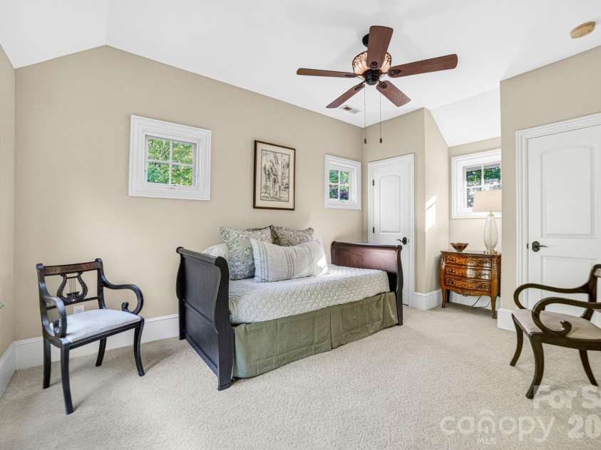 14705 Henry Harrison Stillwell Drive, Huntersville, NC 28078.  MLS# CAR4357146, YatesRealty ID 19182. 3 additional bedrooms (two with ensuite bathrooms) complement the upper level. All upper level bedrooms include plush carpeting, ceiling fans with lights and spectacular scenic windows