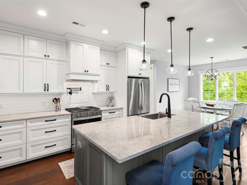 231 Tower Circle, Hendersonville, NC 28739.  MLS# CAR4372970, YatesRealty ID 19183. Designed for entertaining with ease