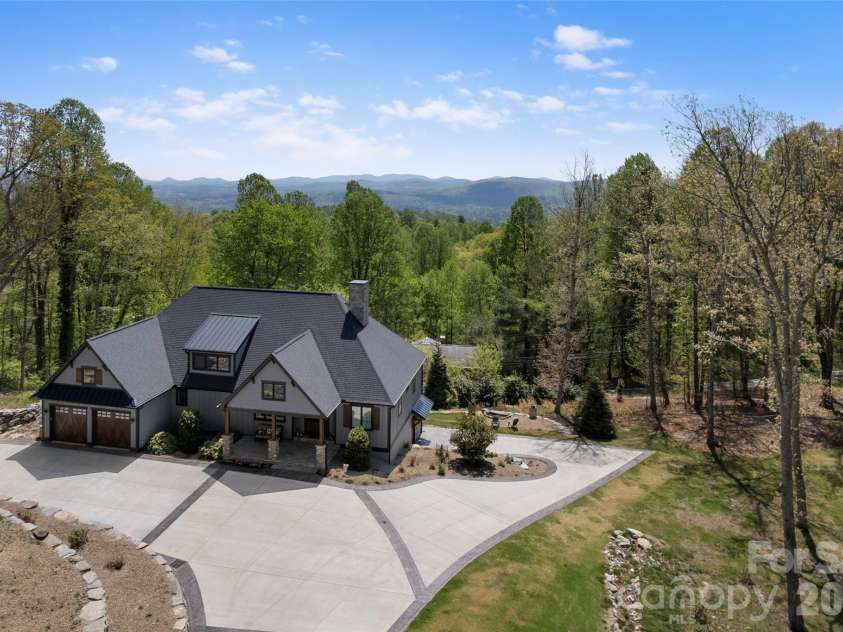 231 Tower Circle, Hendersonville, NC 28739.  MLS# CAR4372970, YatesRealty ID 19183. Laurel Park luxury awaits!
