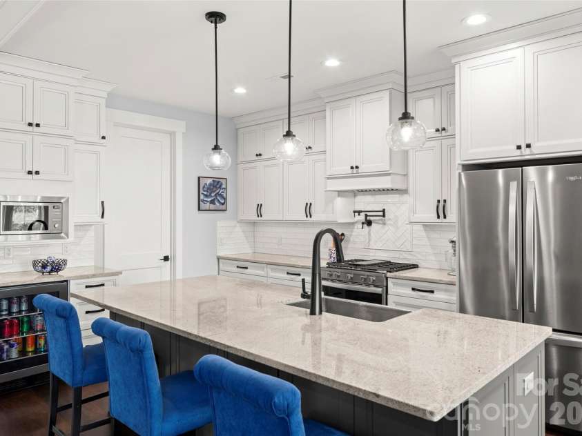 231 Tower Circle, Hendersonville, NC 28739.  MLS# CAR4372970, YatesRealty ID 19183. Spacious kitchen with large pantry