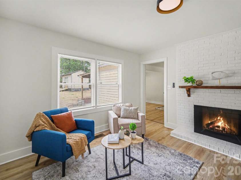 694 Forest Street, Concord, NC 28025.  MLS# CAR4367957, YatesRealty ID 19184. Cozy Fireplace