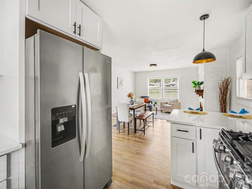 694 Forest Street, Concord, NC 28025.  MLS# CAR4367957, YatesRealty ID 19184. Kitchen with breakfast bar