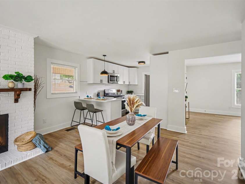 694 Forest Street, Concord, NC 28025.  MLS# CAR4367957, YatesRealty ID 19184. Living/dining area