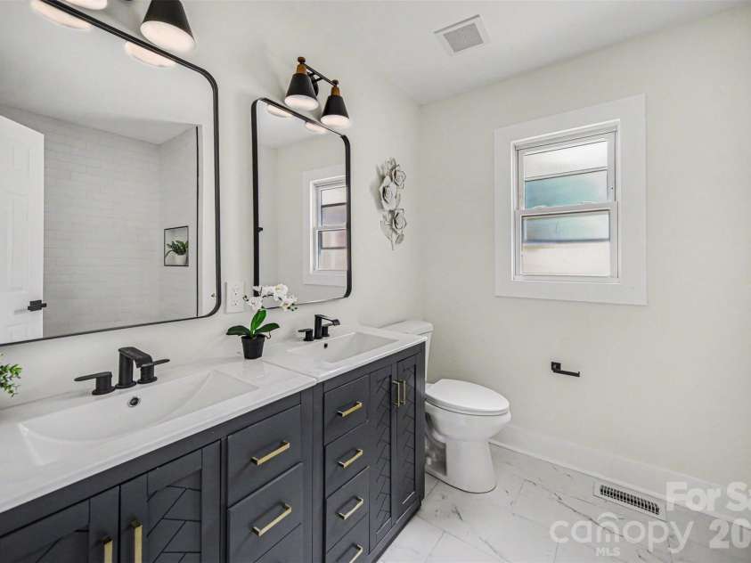 694 Forest Street, Concord, NC 28025.  MLS# CAR4367957, YatesRealty ID 19184. Primary Bathroom