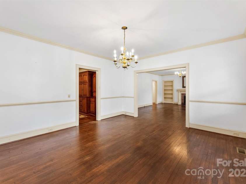 805 Main Street, Mount Holly, NC 28120.  MLS# CAR4269135, YatesRealty ID 19184. Dining into family room/den