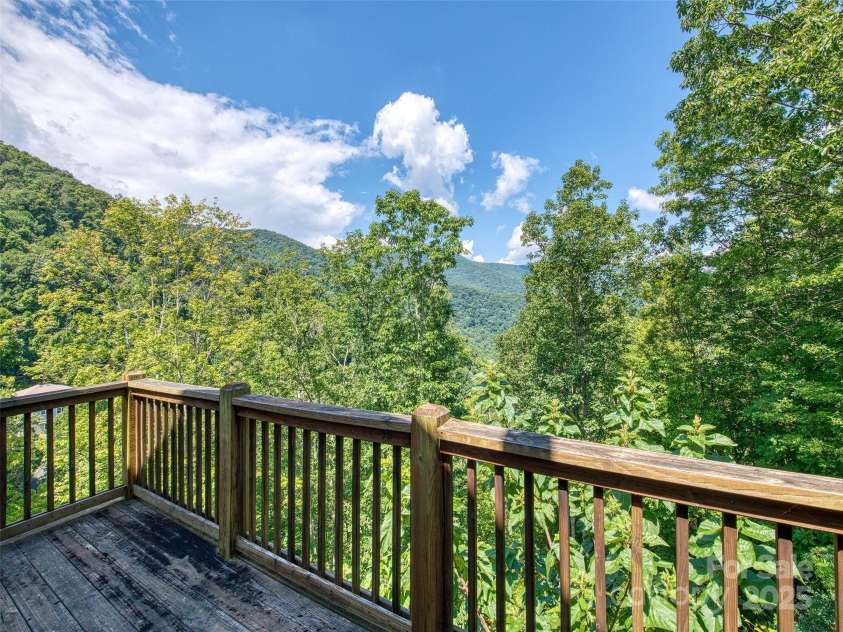 20A Lila Lane, Clyde, NC 28721.  MLS# CAR4258069, YatesRealty ID 19186. Upper level deck with view