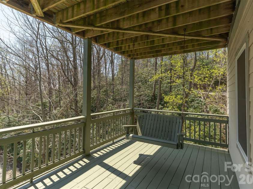 172 Sunny Ridge Road, Hendersonville, NC 28739.  MLS# CAR4375597, YatesRealty ID 19193. Side Privacy on LL Deck