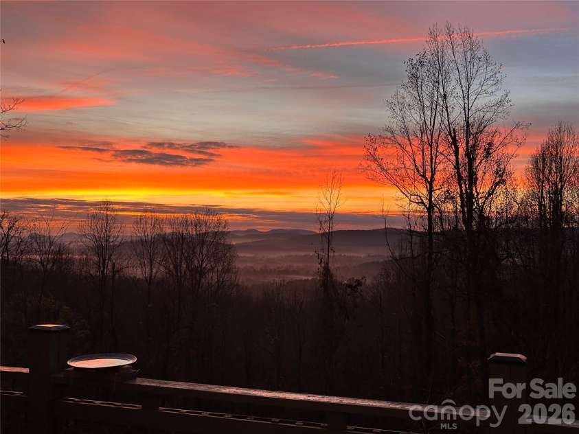 172 Sunny Ridge Road, Hendersonville, NC 28739.  MLS# CAR4375597, YatesRealty ID 19193. Sunrise from Deck