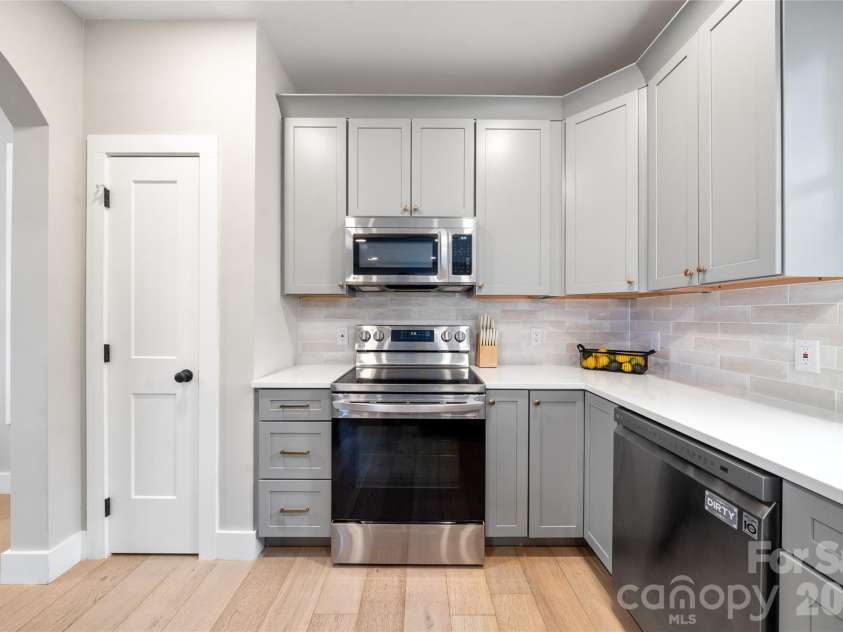 204 Maple Avenue, Marion, NC 28752.  MLS# CAR4338349, YatesRealty ID 19194. LG Stainless appliances and pantry storage