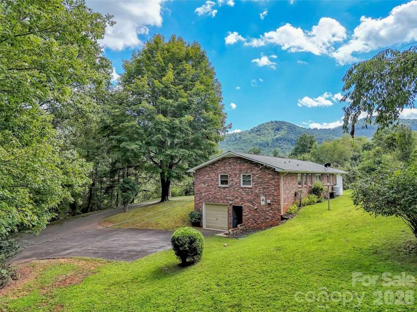 250 Reeves Cove Road, Candler, NC 28715.  MLS# CAR4376677, YatesRealty ID 19199. 