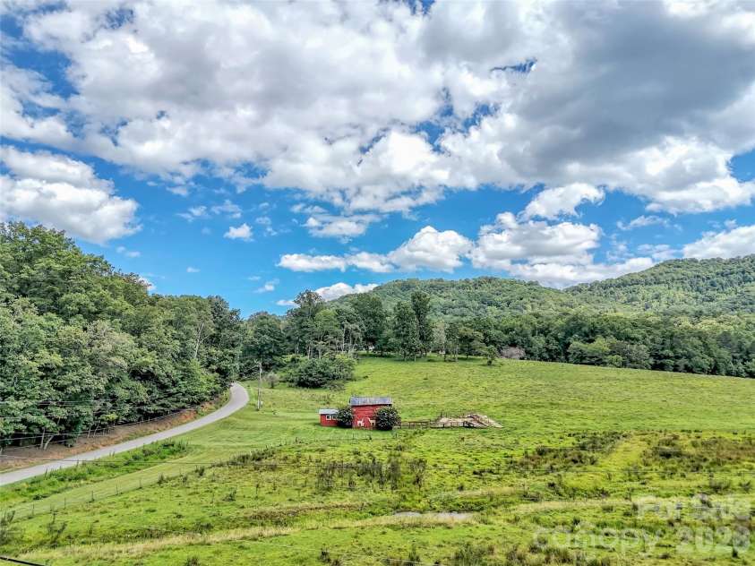 250 Reeves Cove Road, Candler, NC 28715.  MLS# CAR4376677, YatesRealty ID 19199. 