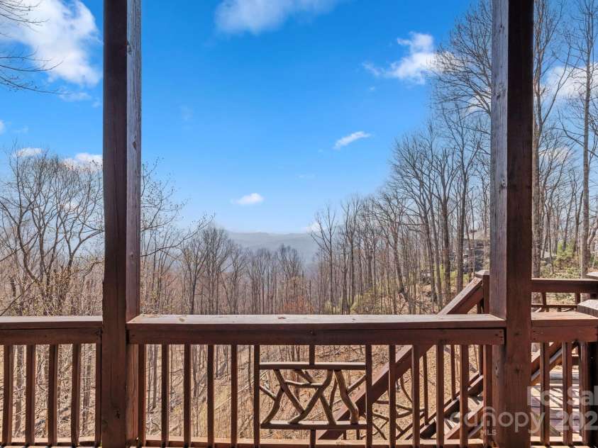 277 Kestrel Court, Sapphire, NC 28774.  MLS# CAR4238900, YatesRealty ID 19199. Breathtaking views from all three levels of decks.