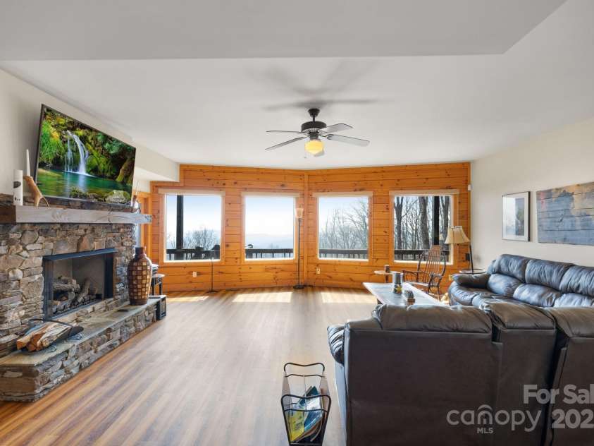 277 Kestrel Court, Sapphire, NC 28774.  MLS# CAR4238900, YatesRealty ID 19199. Lower level family room.