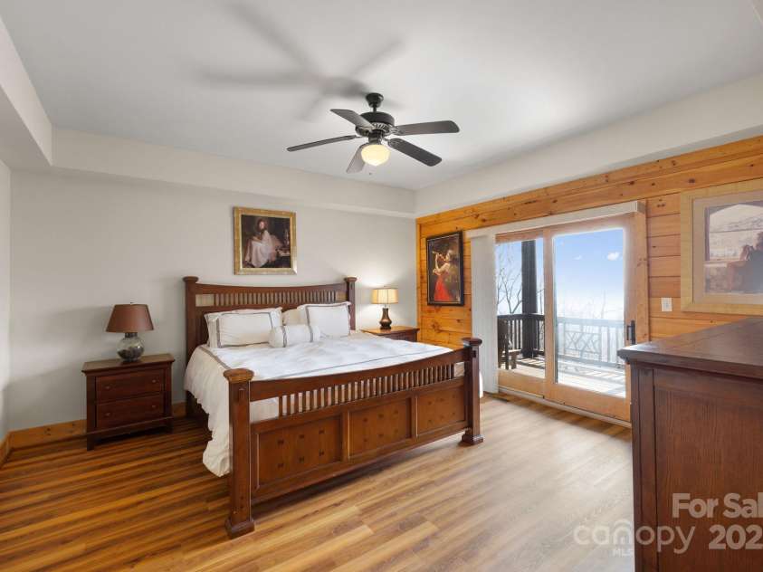 277 Kestrel Court, Sapphire, NC 28774.  MLS# CAR4238900, YatesRealty ID 19199. Lower level guest bedroom.