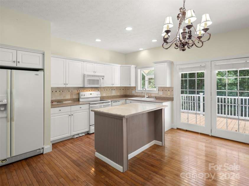 4901 Brevard Road, Horse Shoe, NC 28742.  MLS# CAR4180919, YatesRealty ID 192. Guest house kitchen