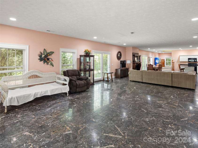 4901 Brevard Road, Horse Shoe, NC 28742.  MLS# CAR4180919, YatesRealty ID 192. Main house basement apartment