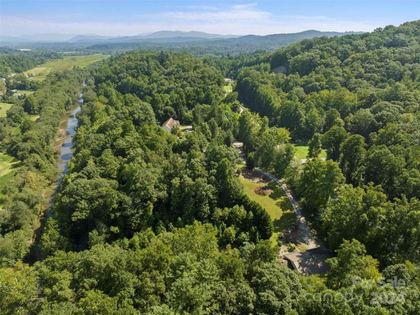4901 Brevard Road, Horse Shoe, NC 28742.  MLS# CAR4180919, YatesRealty ID 192. Over 6 acres with the French Broad River and Ecusta Trail in your backyard!