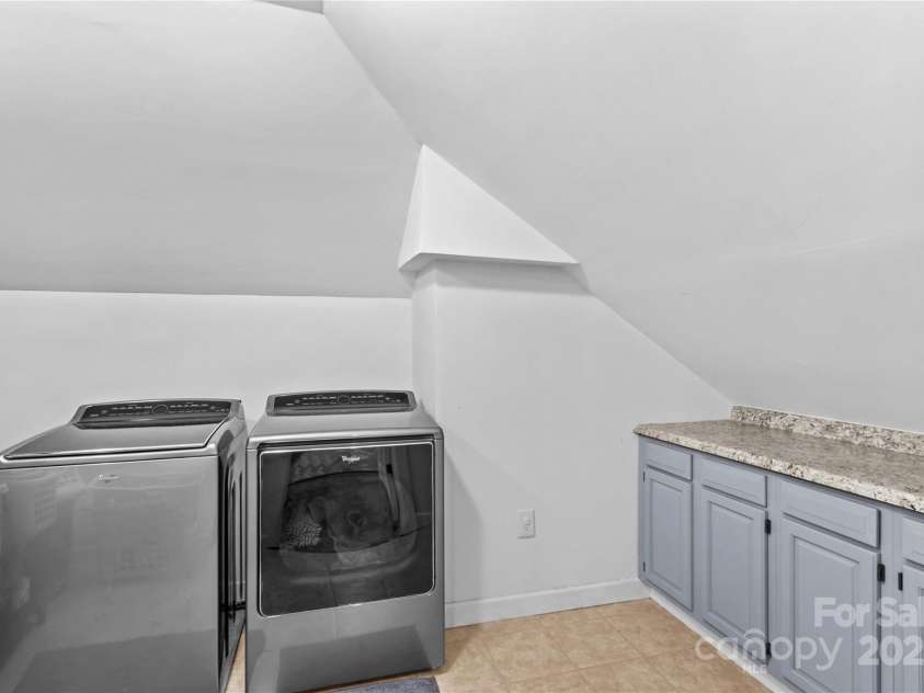 141 Ridge Top Road, Mooresville, NC 28117.  MLS# CAR4255912, YatesRealty ID 19205. Laundry room located off of loft area