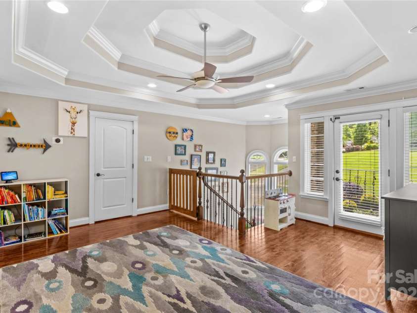 141 Ridge Top Road, Mooresville, NC 28117.  MLS# CAR4255912, YatesRealty ID 19205. Open loft is connected to the laundry room, two secondary bedrooms and a Juliet balcony